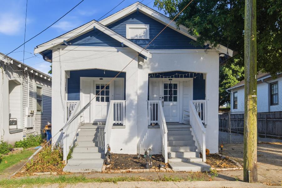 Front of 1708 S. Lopez Street, a navy and white double in Broadmoor