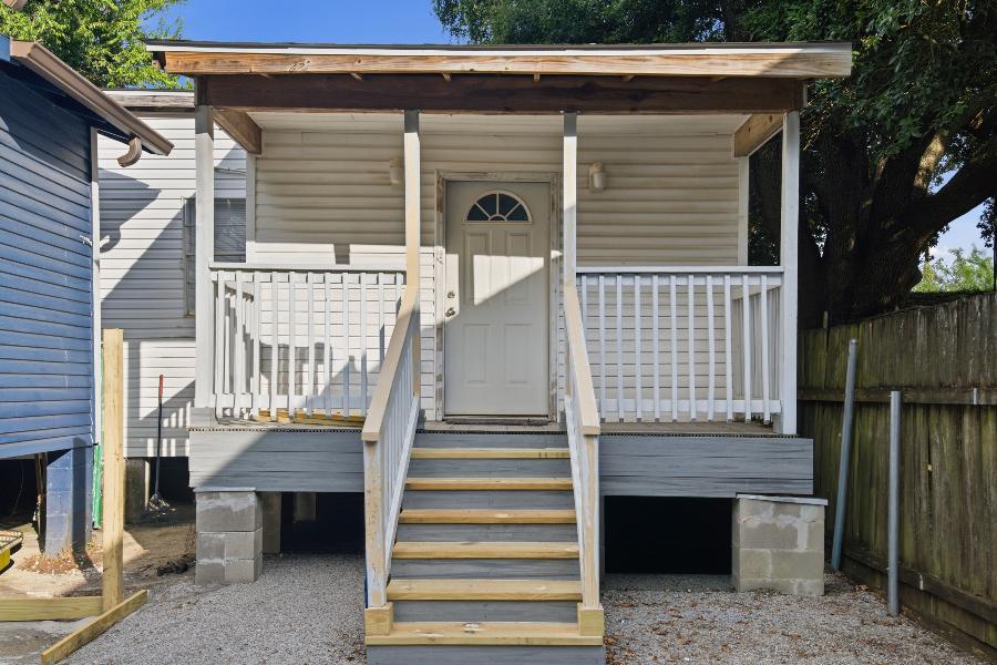 Covered front porch and entry door