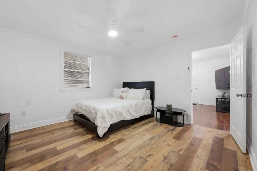 Bedroom with door open to the living room
