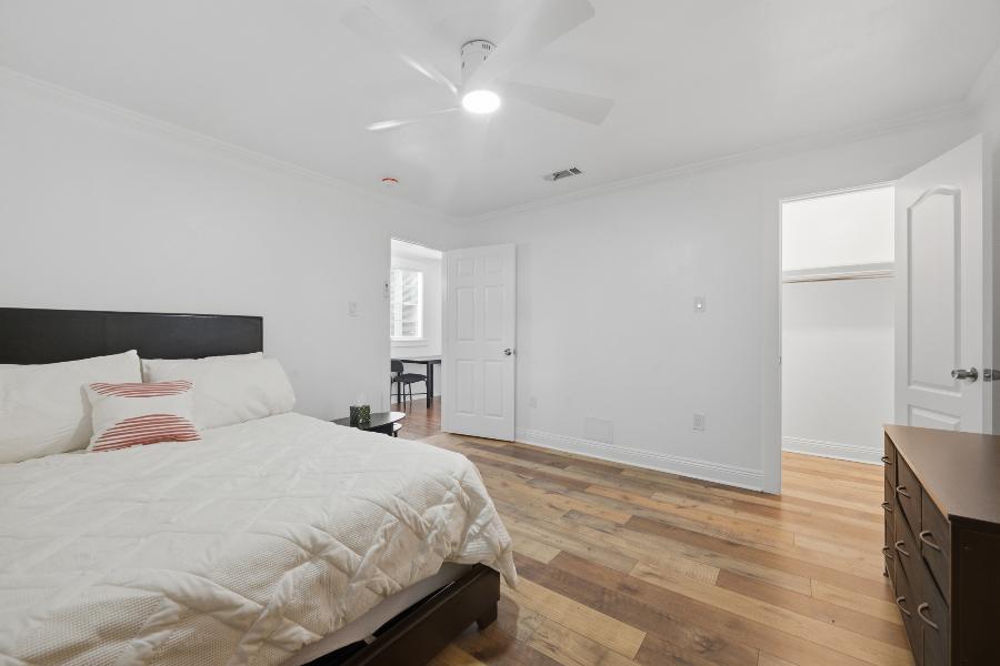 Bedroom with walk-in closet