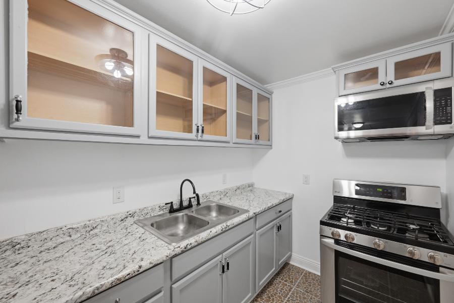 Kitchen sink, counters and gas range